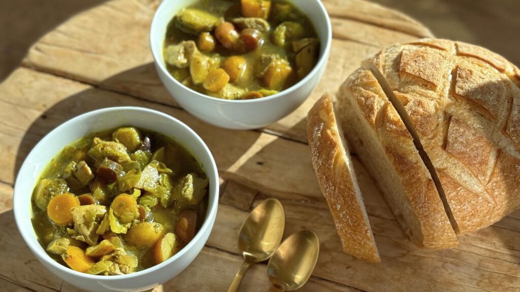 Holiday slow cooker pot roast made with tender beef, baby potatoes, carrots, and herbs for an easy one-dish family dinner by Studio KSL
